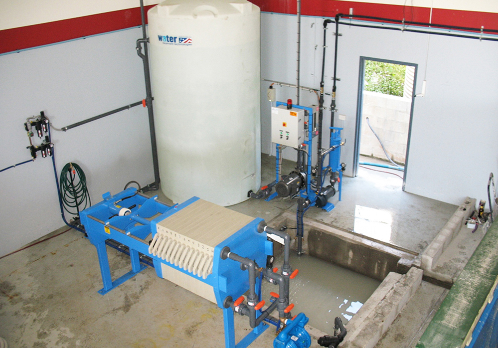 WATER TREATMENT PRESS SYSTEM