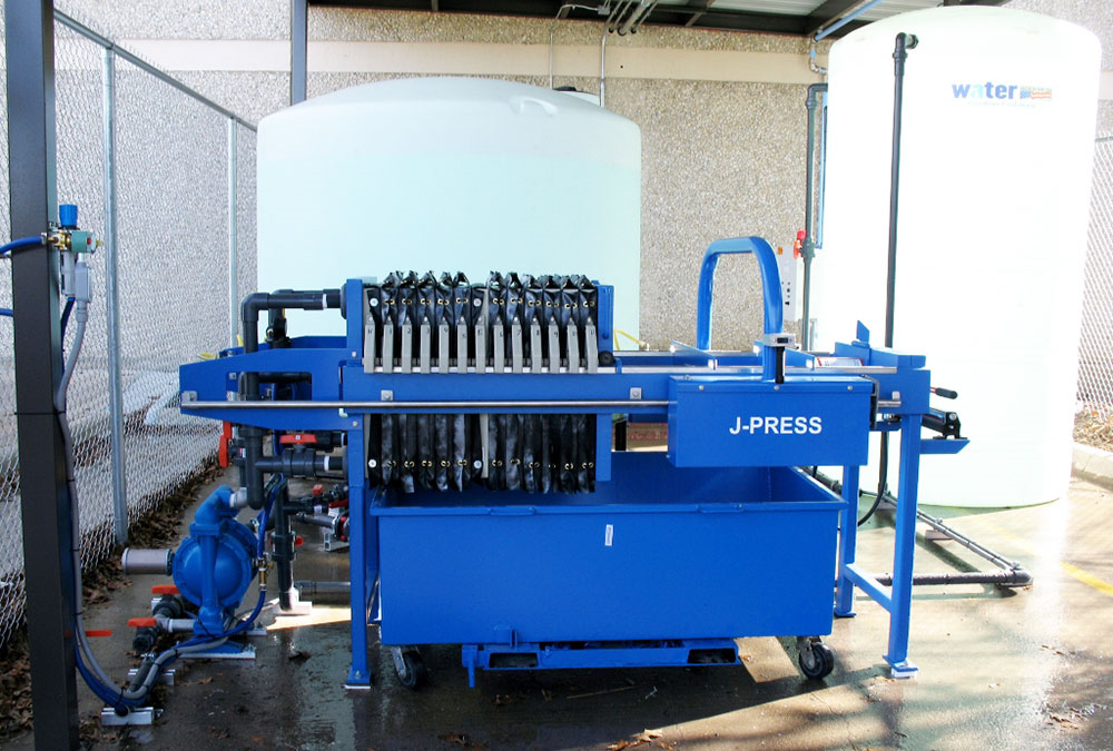 WATER TREATMENT PRESS SYSTEM