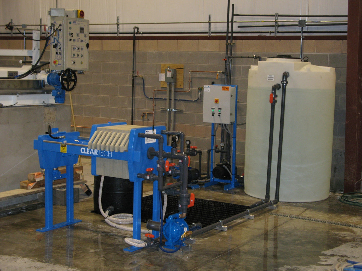 WATER TREATMENT PRESS SYSTEM