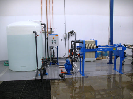 WATER TREATMENT PRESS SYSTEM