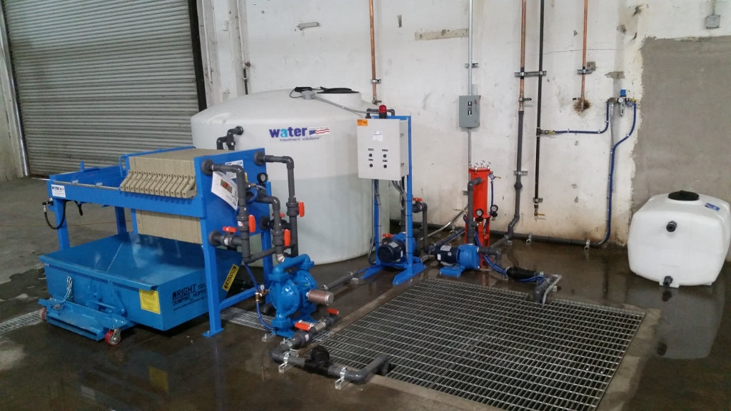 WATER TREATMENT PRESS SYSTEM