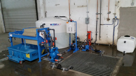 WATER TREATMENT PRESS SYSTEM