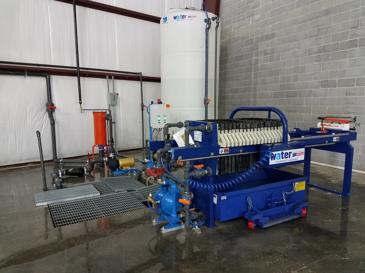 WATER TREATMENT PRESS SYSTEM